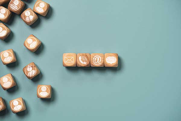customer-service-business-contact-concept-wooden-cube-block-which-print-screen-letter-telephone-email-address-message